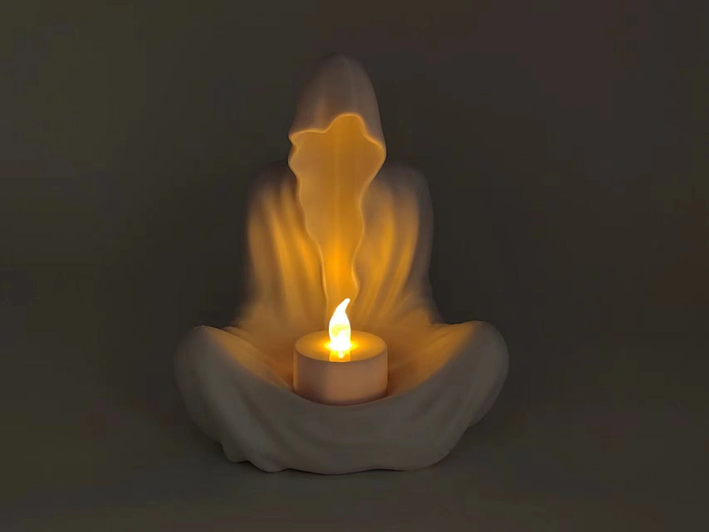 Ghost Candle Holder available in multiple colors with accompanying Yellow LED Candle
