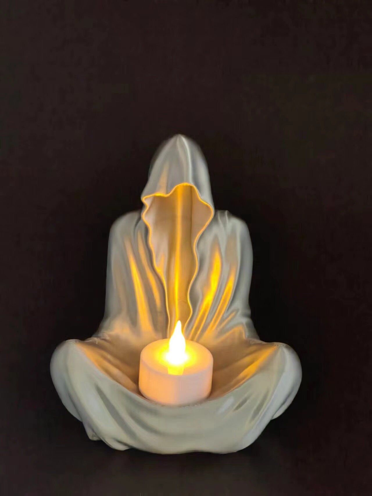 Ghost Candle Holder available in multiple colors with accompanying Yellow LED Candle