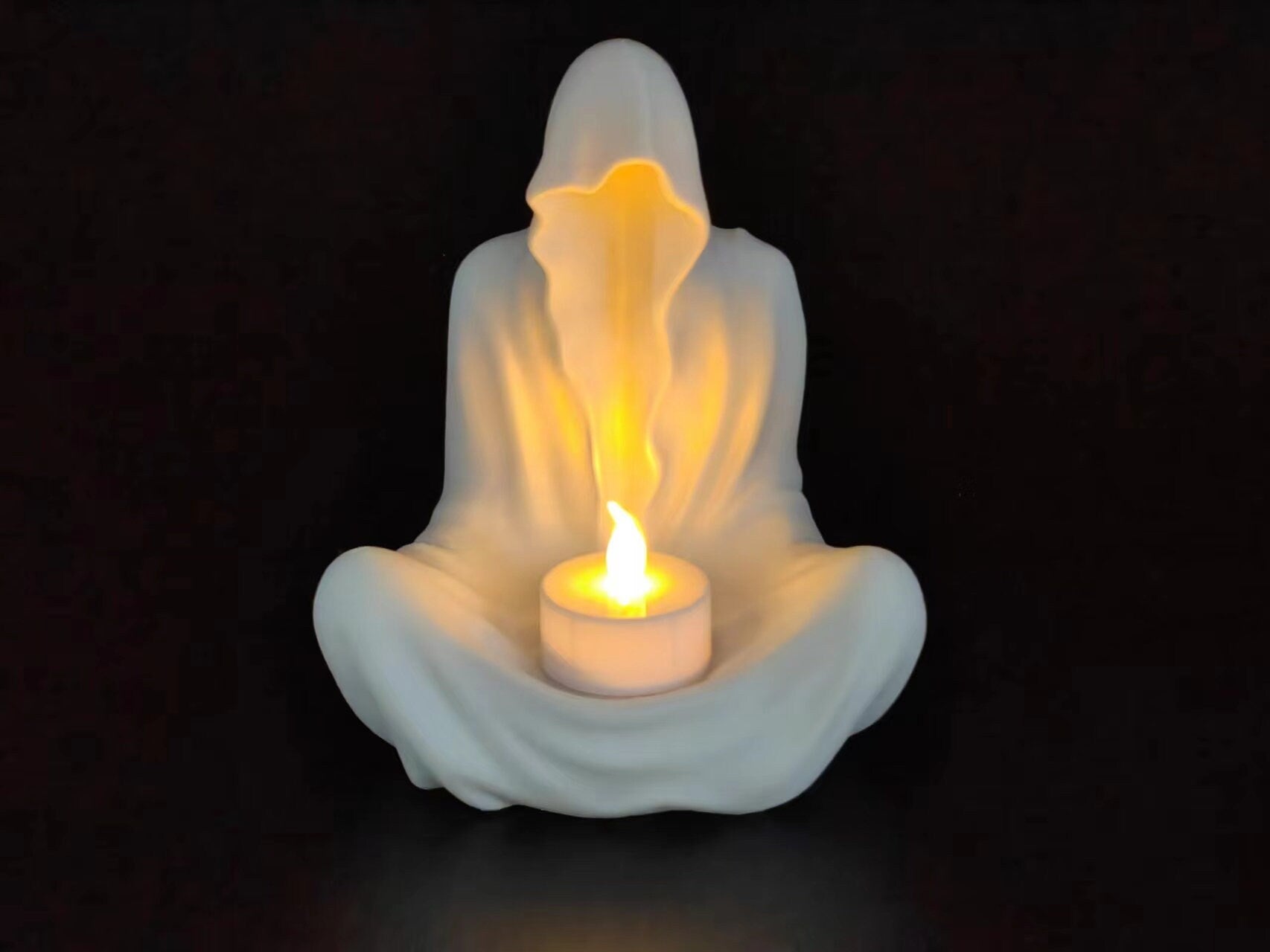 Ghost Candle Holder available in multiple colors with accompanying Yellow LED Candle