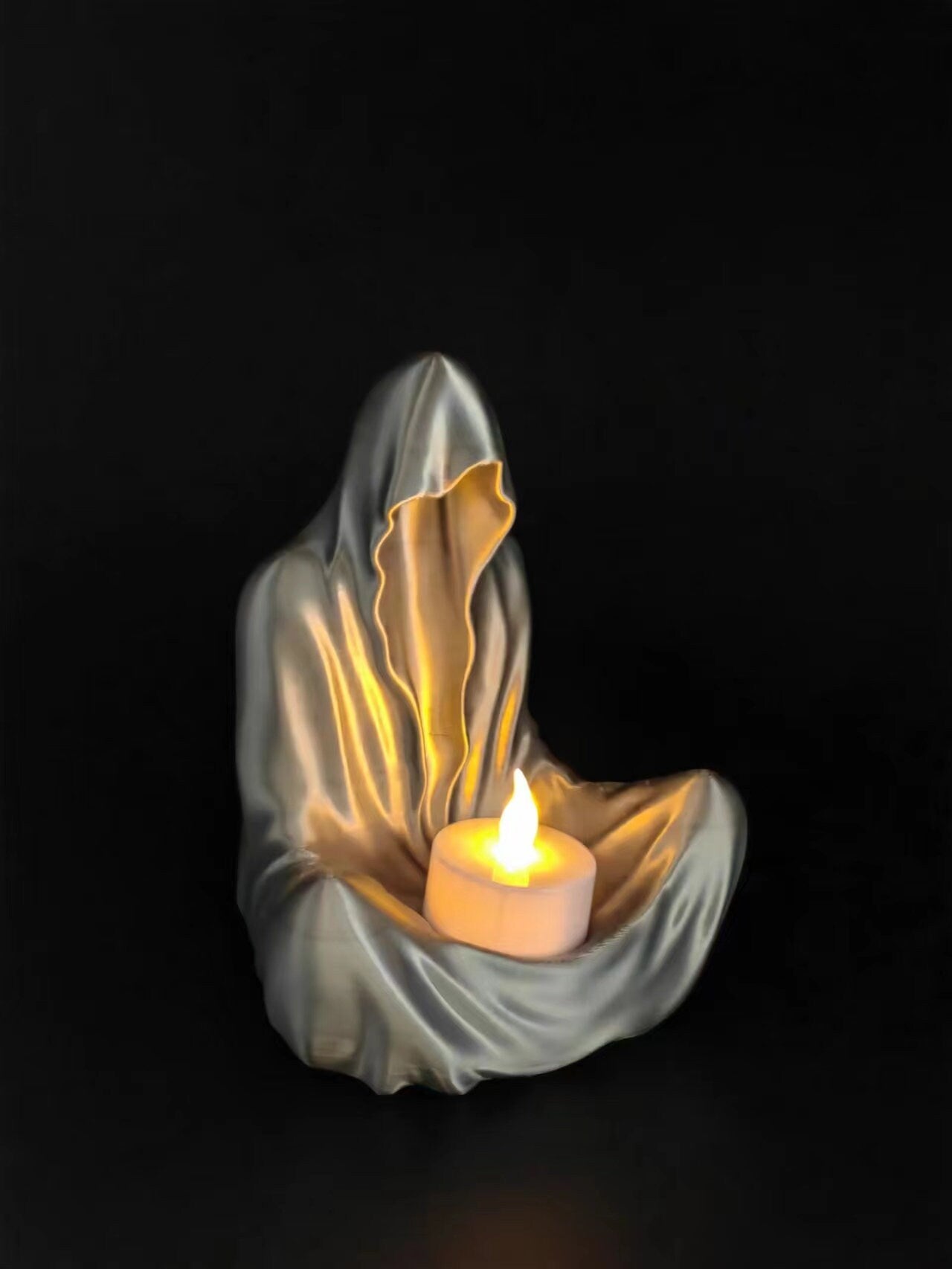 Ghost Candle Holder available in multiple colors with accompanying Yellow LED Candle