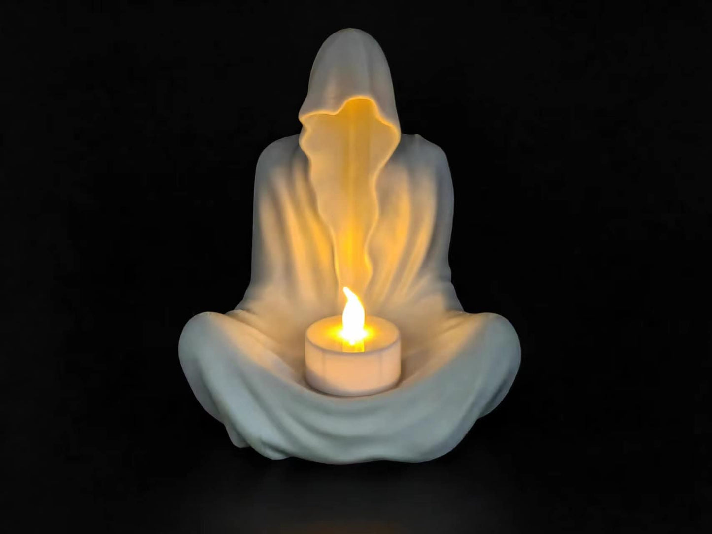Ghost Candle Holder available in multiple colors with accompanying Yellow LED Candle