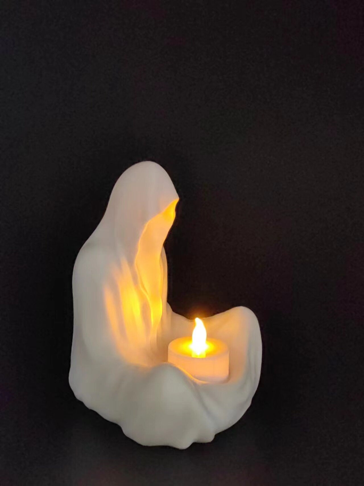 Ghost Candle Holder available in multiple colors with accompanying Yellow LED Candle